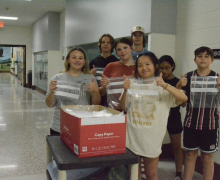 Heritage Middle School students pose for a photo with some of the bags collected. Chrissy Murphy, Morganton News Herald