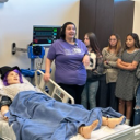 GEAR UP students learn about the patient care simulators at TCCC. 