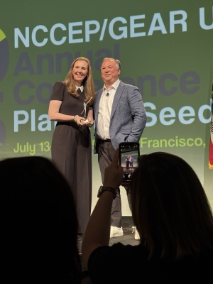 Alex Chough, president of the National Council for Community and Education Partnerships (NCCEP), right, presents the 2025 GEAR UP Professional Leader of the Year award to Corinne Smith, director of App State’s GEAR UP (Gaining Early Awareness and Readiness for Undergraduate Programs) and deputy director of College Access Partnerships, during the NCCEP/GEAR UP Annual Conference on July 14 in San Francisco.